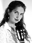 Nora Buschman, Gitarristin